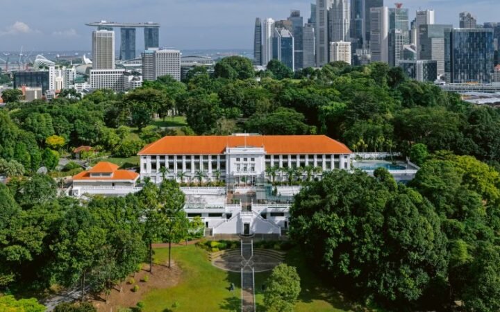 METT Singapore, part of Sunset Hospitality Group, in Fort Canning Park with the city skyline behind.