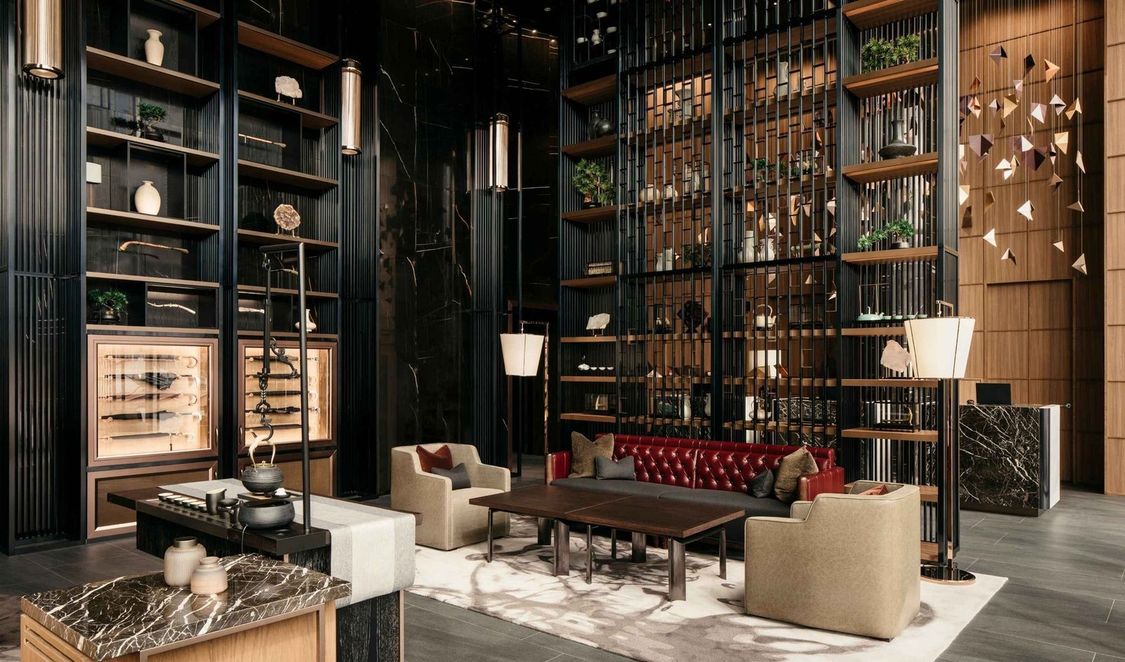 Lobby seating and decorative shelving at The Clan Hotel Singapore