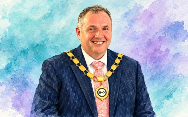 Watercolour illustration of Nicky Cassidy wearing the Northern Ireland Hotels Federation president’s chain