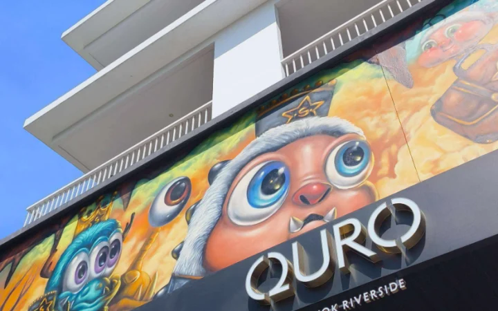 QURO Bangkok Riverside façade with colourful contemporary artwork and the hotel’s new signage.