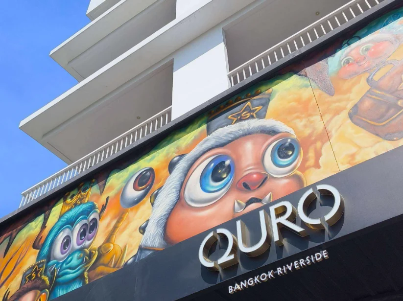 QURO Bangkok Riverside façade with colourful contemporary artwork and the hotel’s new signage.