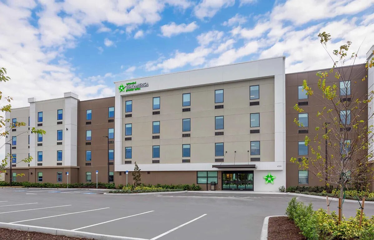 Sandpiper Hospitality expansion press photograph showing an Extended Stay America Premier Suites hotel